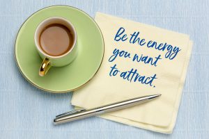 Acts as if - Be the energy you want to attract - handwriting on napkin with a cup of coffee, law of attraction concept