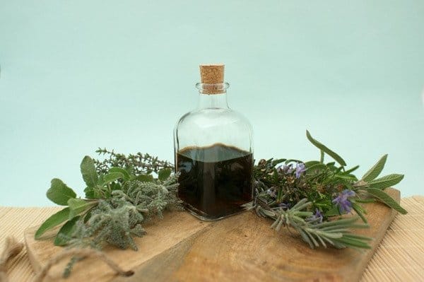 bottle and herbs